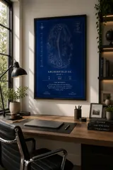 Framed Blueprint style print above a wooden desk