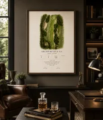 Framed Archerfield GC print above a dark study console